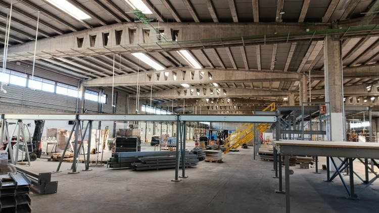 Industrial warehouse with metal structure and logistics storage area