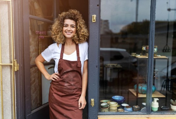 Young woman waiting for GLS delivery